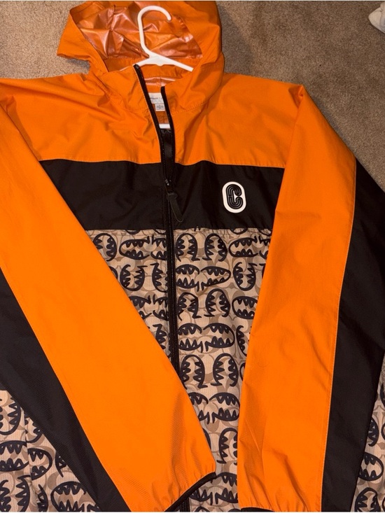 Coach Other - Coach Orange and Black Hooded Rain Jacket with Signature Print